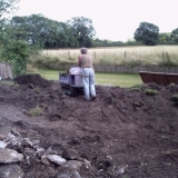Top soil imported to raise lawn area.